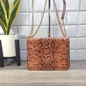 *6521 Michael Kors peach snakeskin convertible crossbody shoulder bag